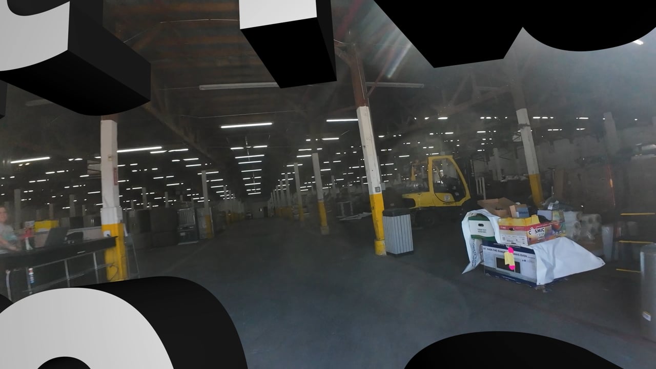 FPV drone tour through a warehouse facility interior