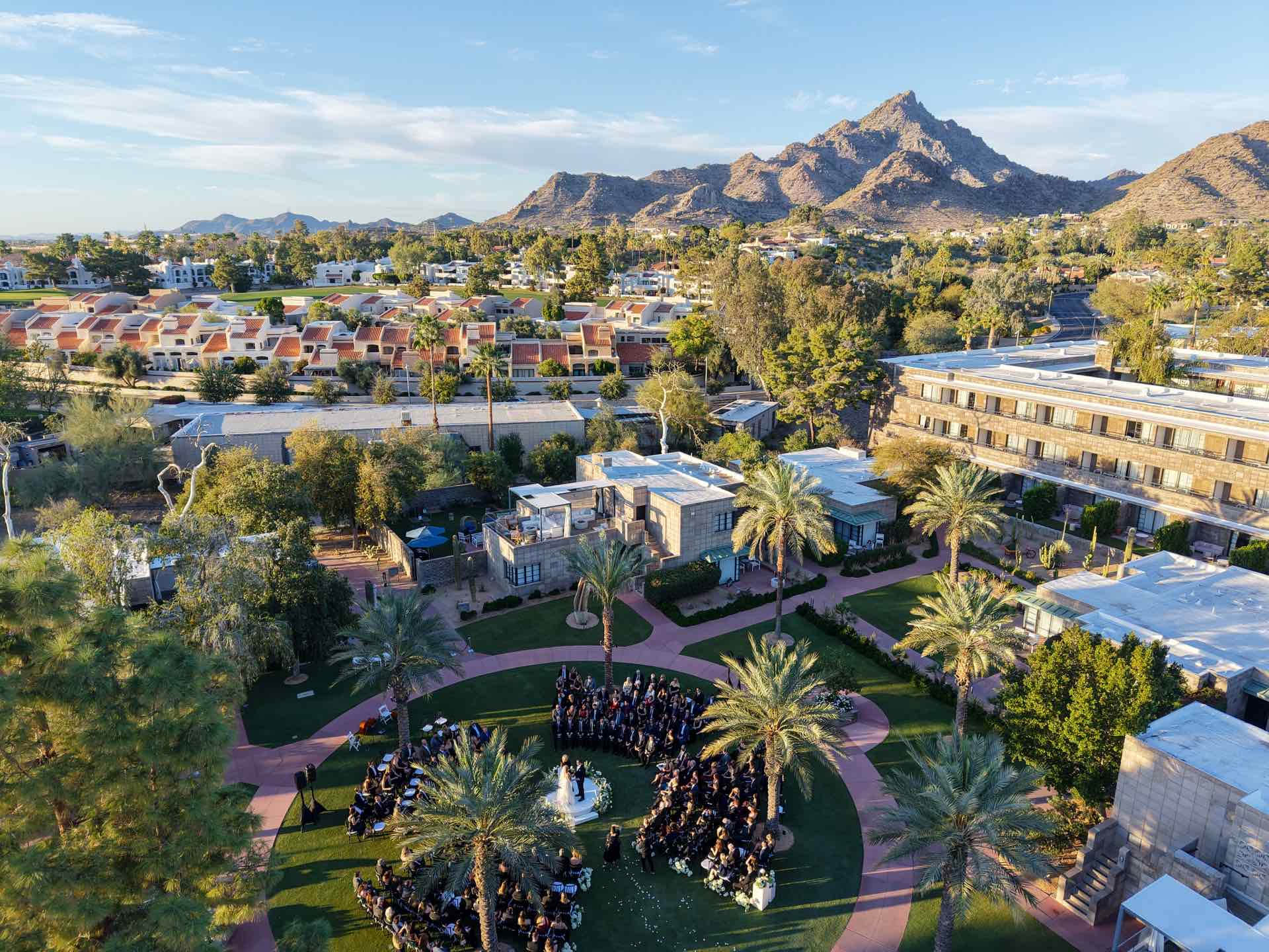 Aerial drone footage of outdoor wedding ceremony